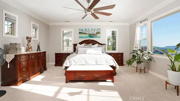 a view of living room with furniture and flat screen tv