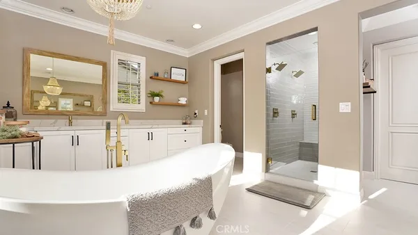 a view of a house with swimming pool and sitting area