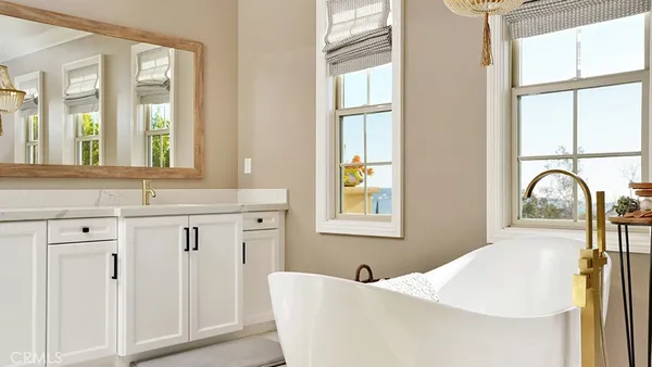 a front view of a residential apartment building with a yard