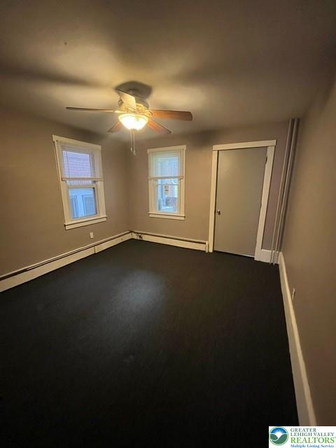 135 West Ridge Street Nesquehoning, PA 18240 - Photo 6 of 6 Dark floors contrast with neutral walls and classic white trim in this versatile bedroom.