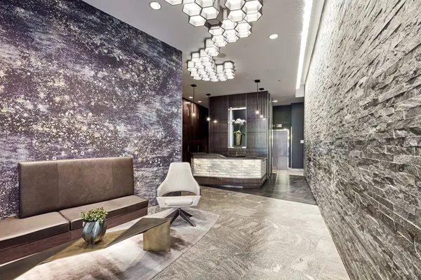 a view of lobby with mirror