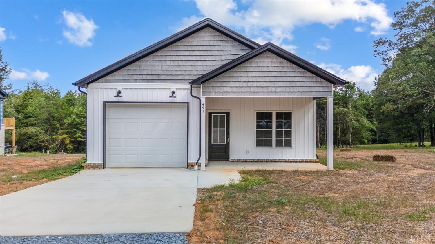 451 Dearborn Road Evington, VA 24550 - Photo 1 of 45 a view of house with backyard and garden