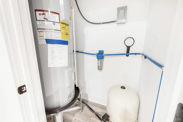 a front view of a house with a yard and outdoor seating