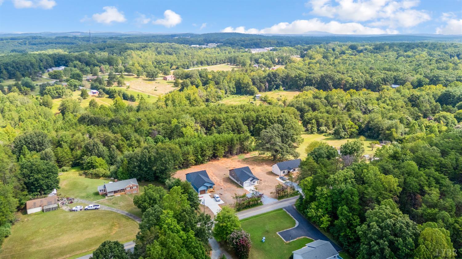451 Dearborn Road Evington, VA 24550 - Photo 39 of 45 an aerial view of a house with a yard