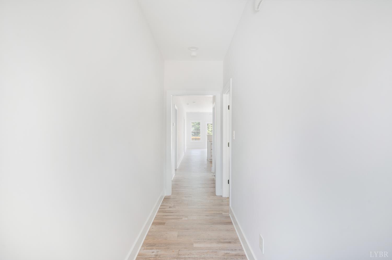 451 Dearborn Road Evington, VA 24550 - Photo 5 of 45 a view of a hallway with wooden floor