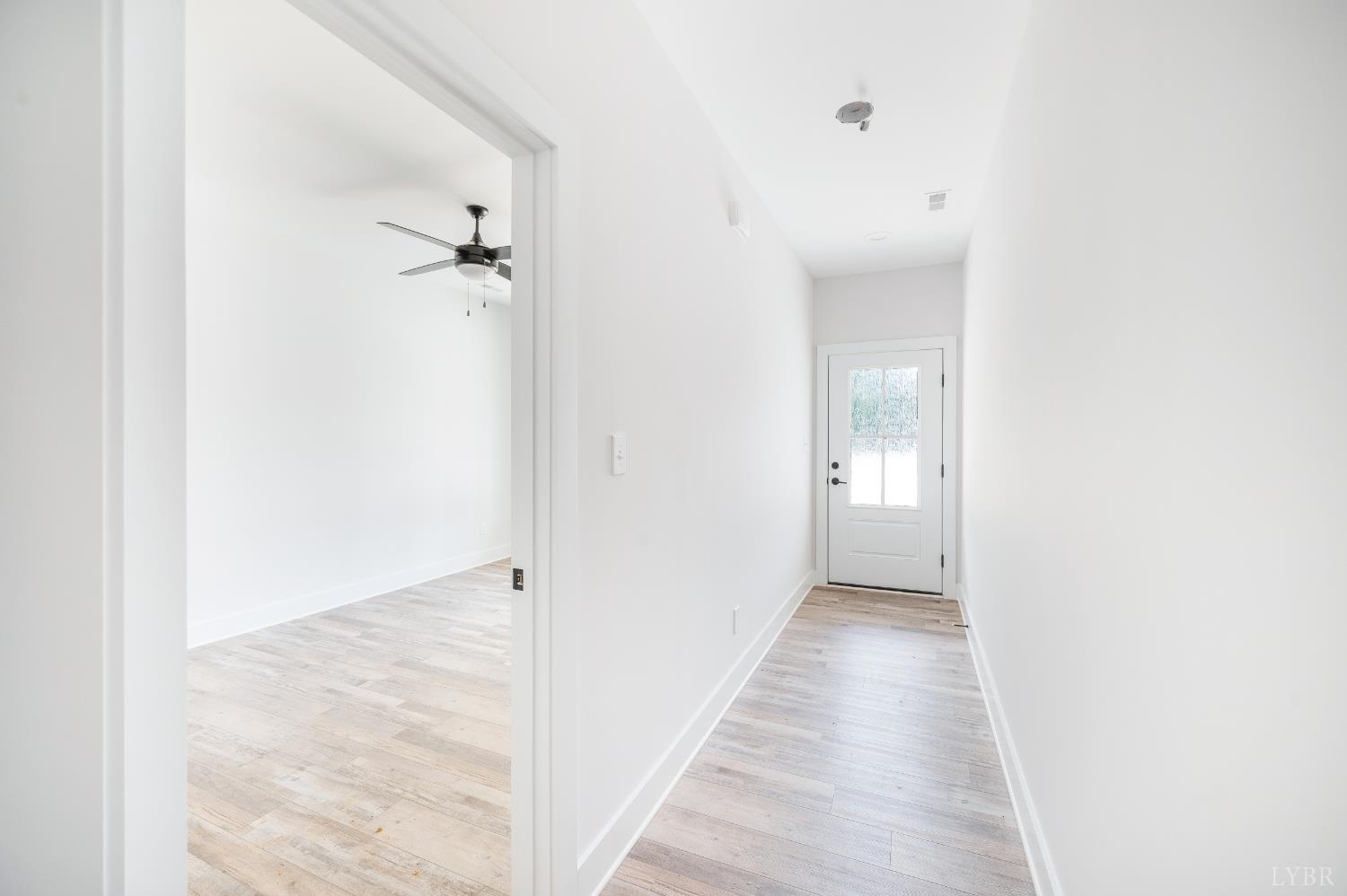 451 Dearborn Road Evington, VA 24550 - Photo 6 of 45 a view of a hallway with a white walls