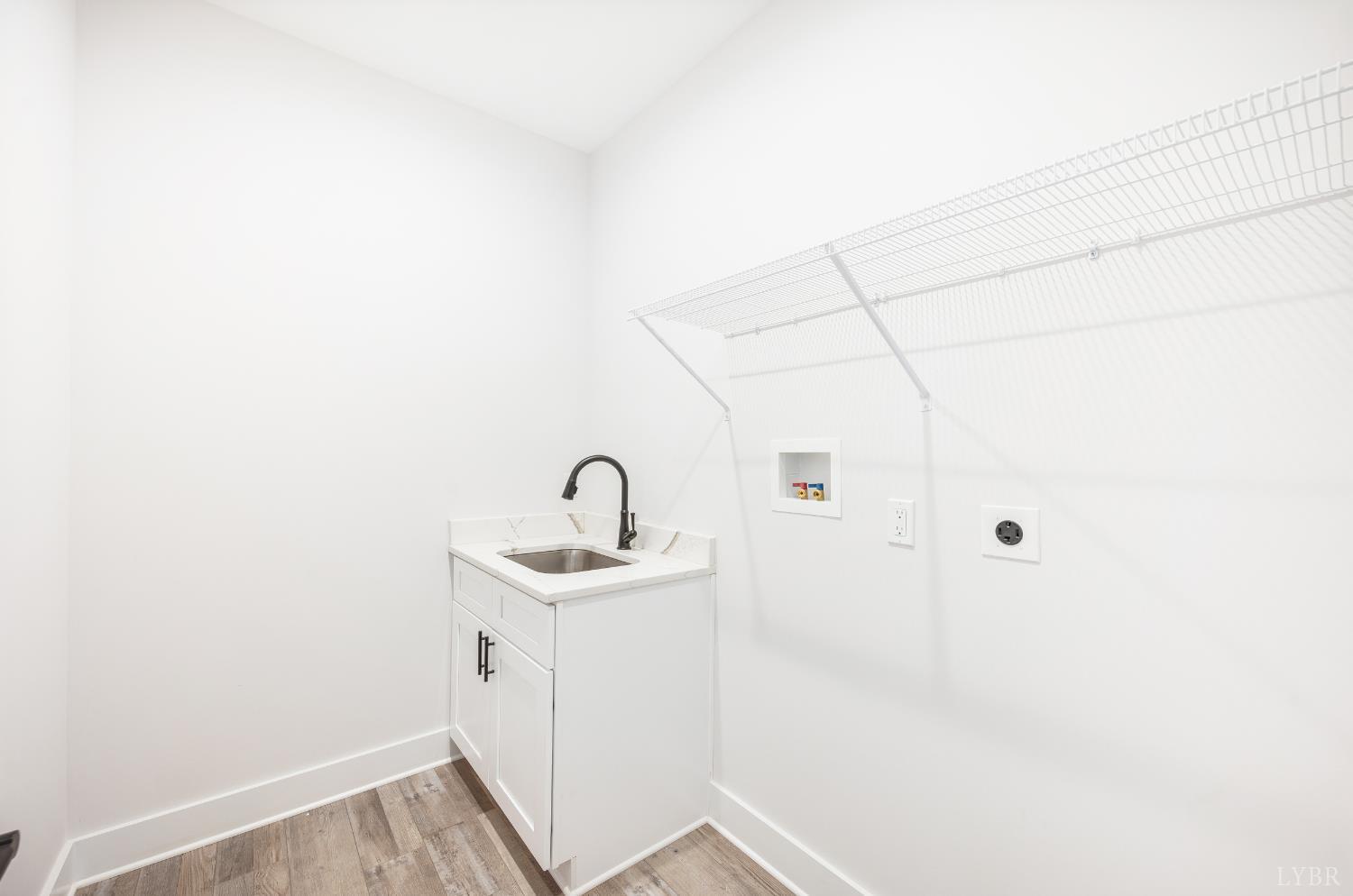 451 Dearborn Road Evington, VA 24550 - Photo 9 of 45 a bathroom with a sink and mirror