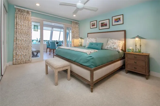 a bathroom with a granite countertop shower a toilet and a sink