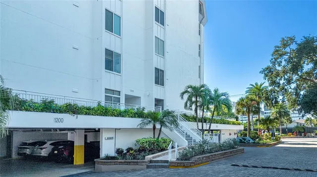 a bathroom with a sink a mirror and a toilet