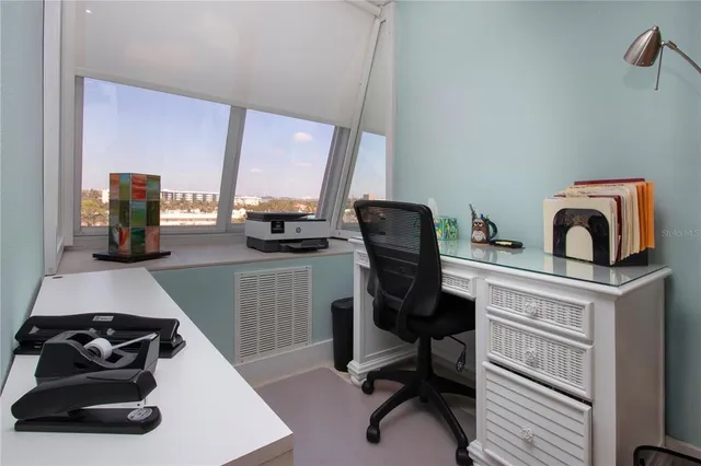 a view of a kitchen from the hallway