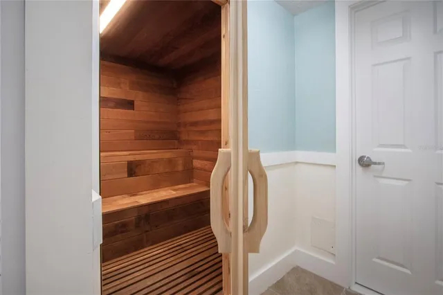 an aerial view of a house with a lake view