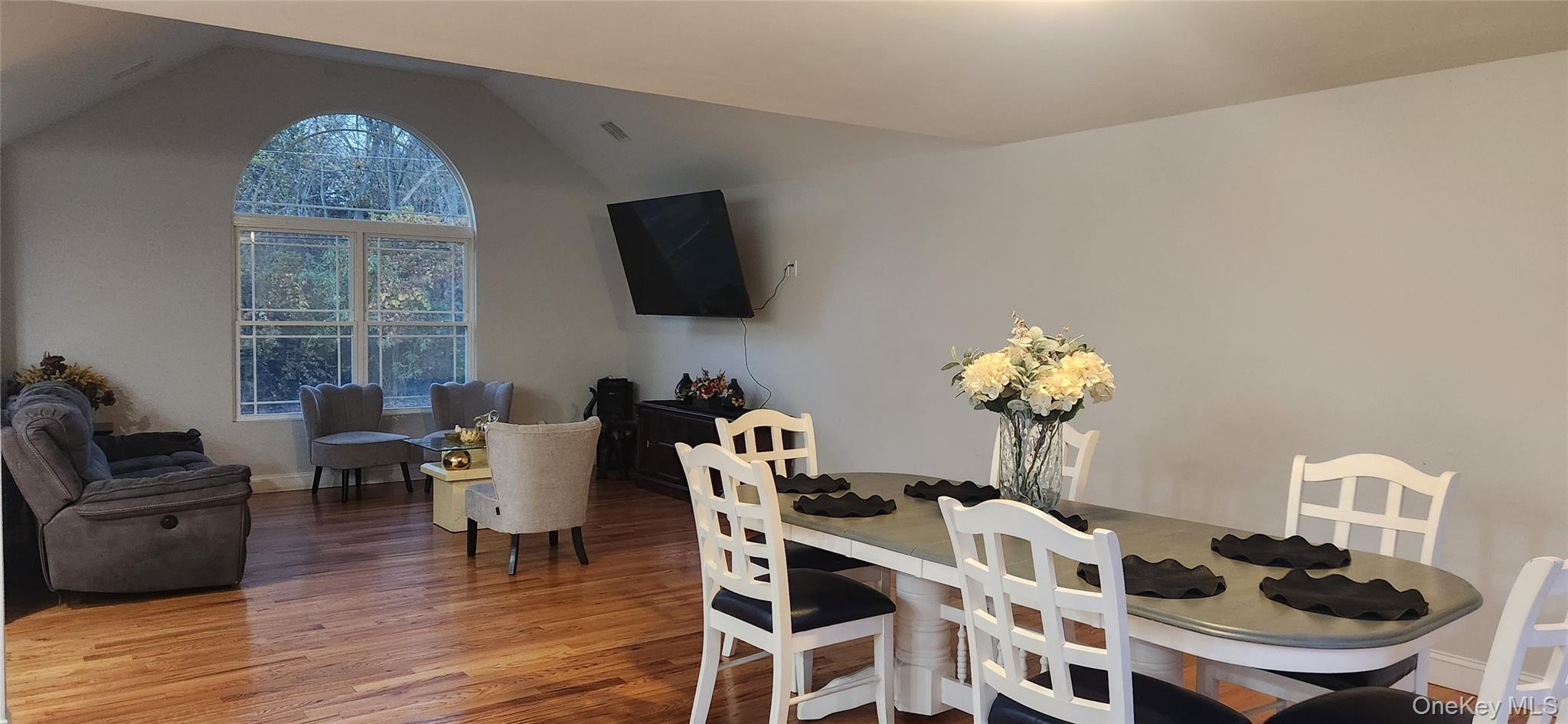 466 Granny Road Medford, NY 11763 - Photo 7 of 14 a view of a dining room with furniture window and wooden floor