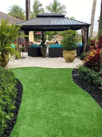 a backyard of a house with lots of green space