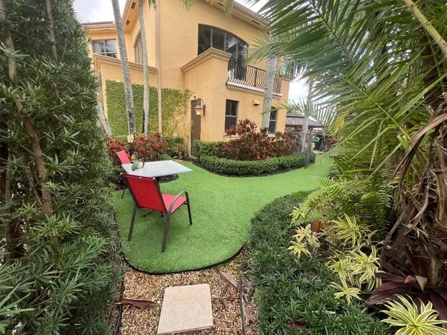 a view of a porch with furniture