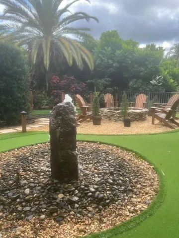 a backyard of a house with lots of green space