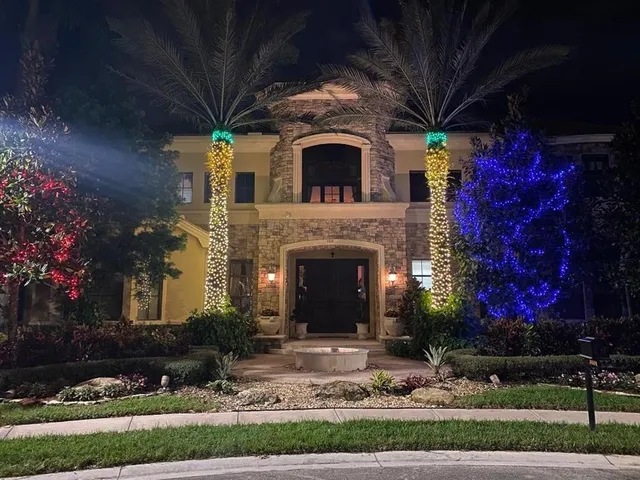 a kitchen with stainless steel appliances kitchen island granite countertop a sink and cabinets