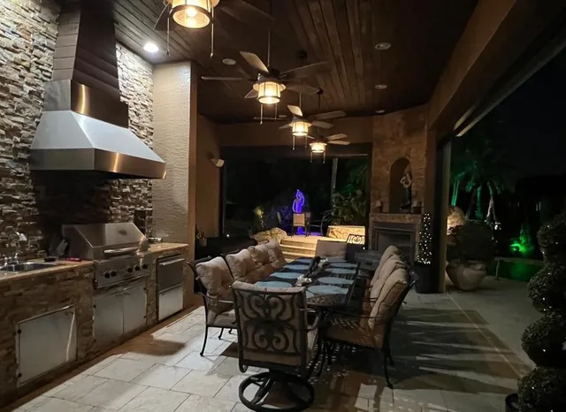 a kitchen with a stove and a refrigerator