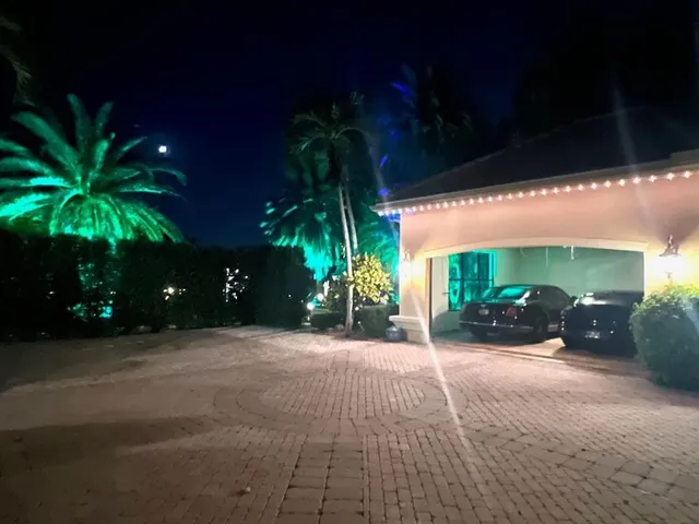 a large bathroom with a large tub and sink
