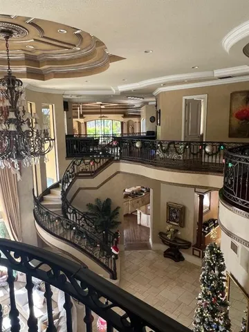 a bathroom with a granite countertop sink a mirror and shower