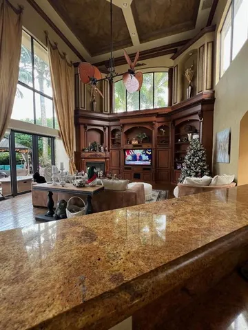 a room with gym equipment and a large window