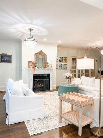 a bed sitting in a room next to a window