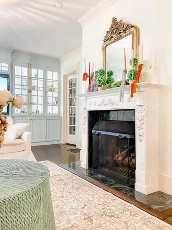 a spacious bathroom with a granite countertop sink mirror and bathtub