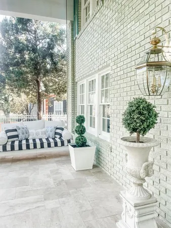 a living room with kitchen island furniture and a wooden floor