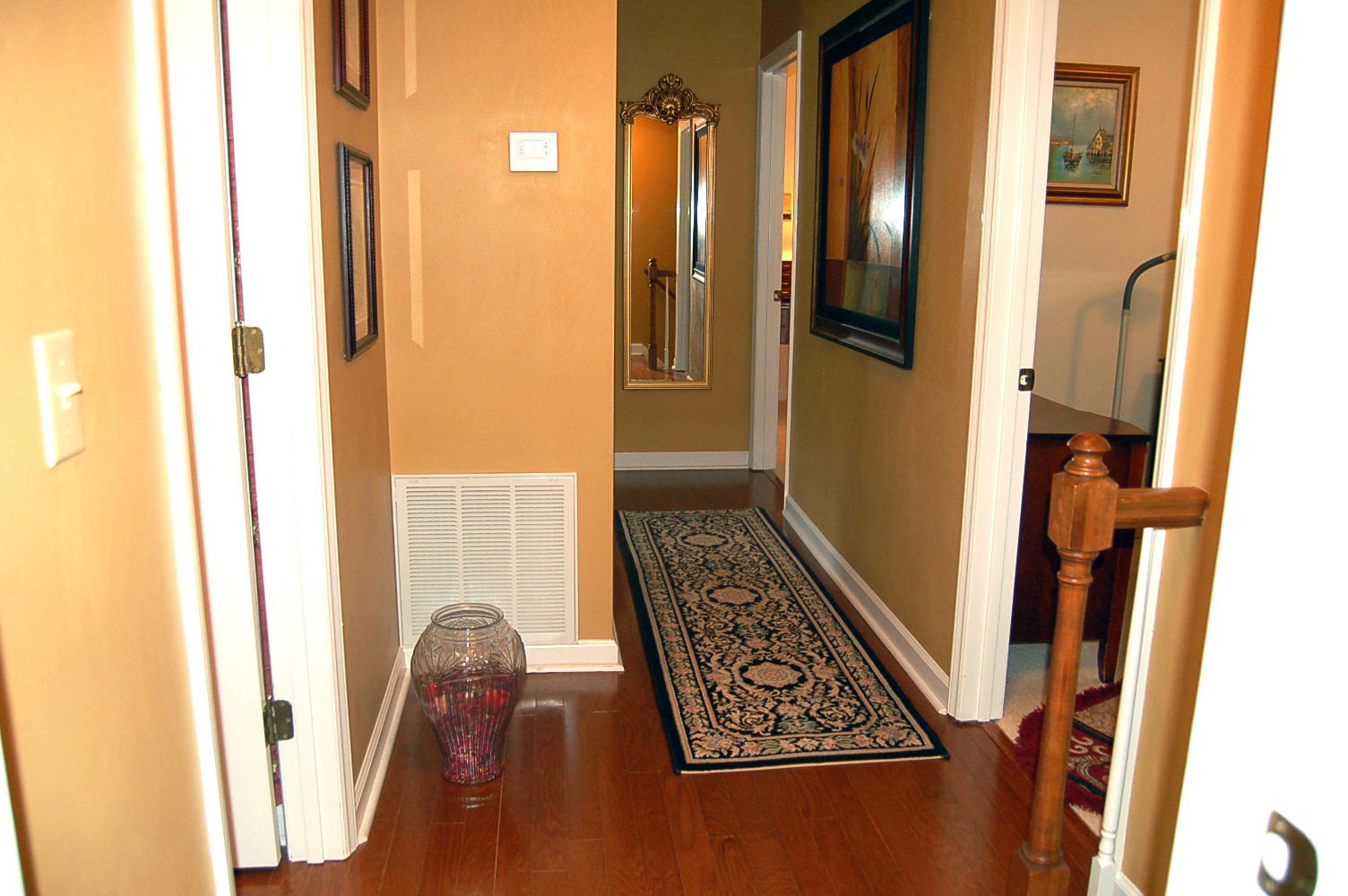 52 Ridgeview Road Blue Ridge, VA 24064 - Photo 14 of 46 a view of a hallway with wooden floor and living room