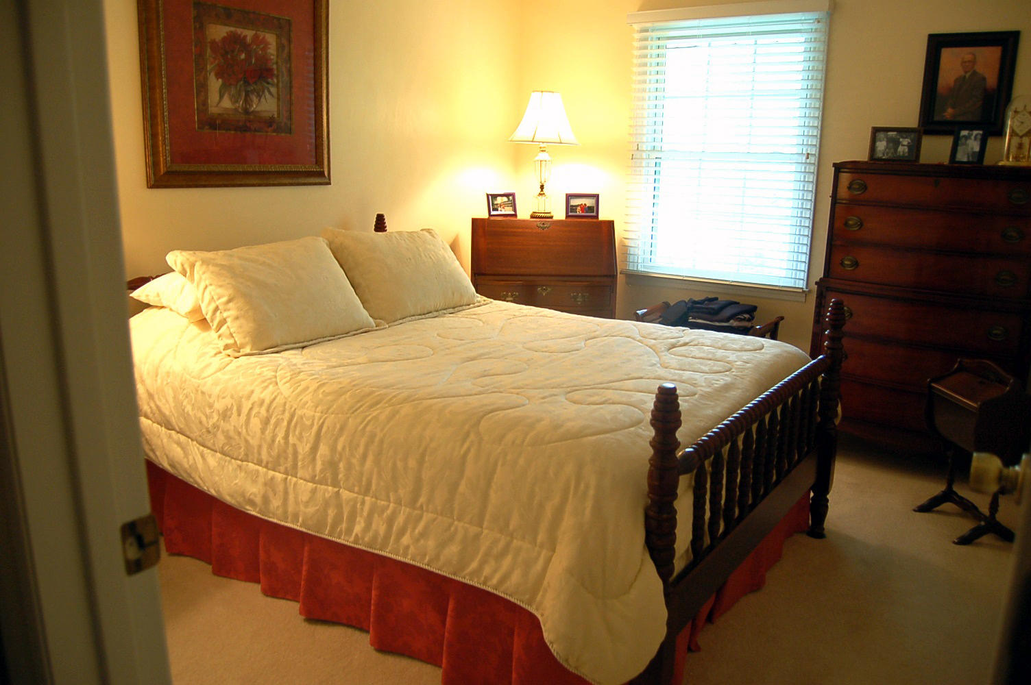 52 Ridgeview Road Blue Ridge, VA 24064 - Photo 21 of 46 a bed sitting in a bedroom next to a window