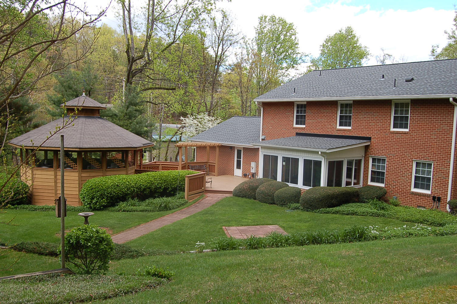 52 Ridgeview Road Blue Ridge, VA 24064 - Photo 27 of 46 a front view of a house with garden
