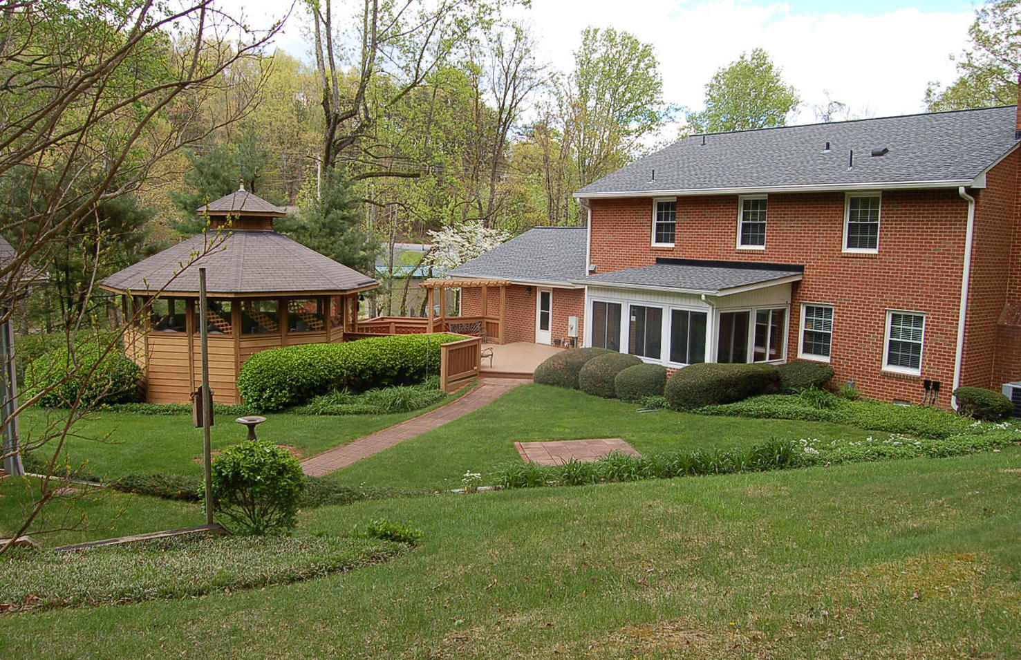 52 Ridgeview Road Blue Ridge, VA 24064 - Photo 28 of 46 a front view of a house with a yard and trees