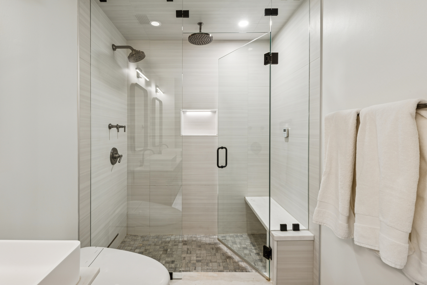 333 West Hubbard Street, Unit 801 Chicago, IL 60654 - Photo 17 of 24 a bathroom with a shower and toilet