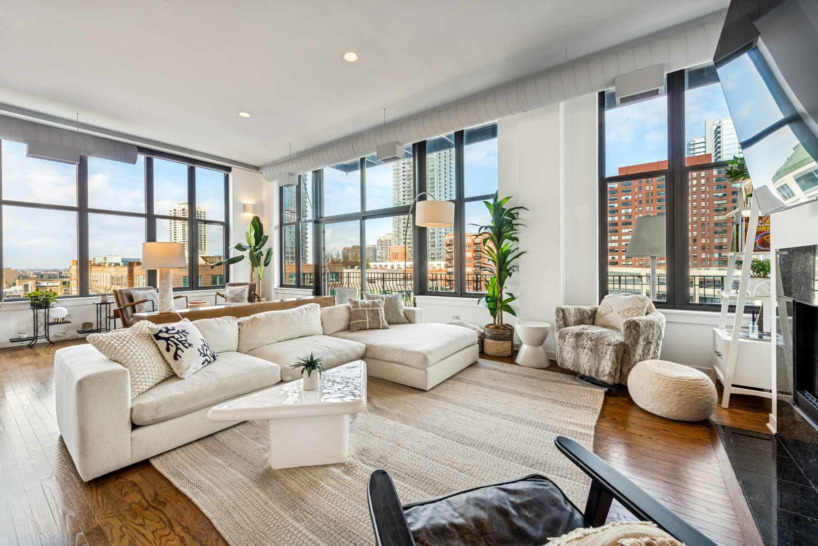 333 West Hubbard Street, Unit 801 Chicago, IL 60654 - Photo 4 of 24 a living room with furniture and a large window