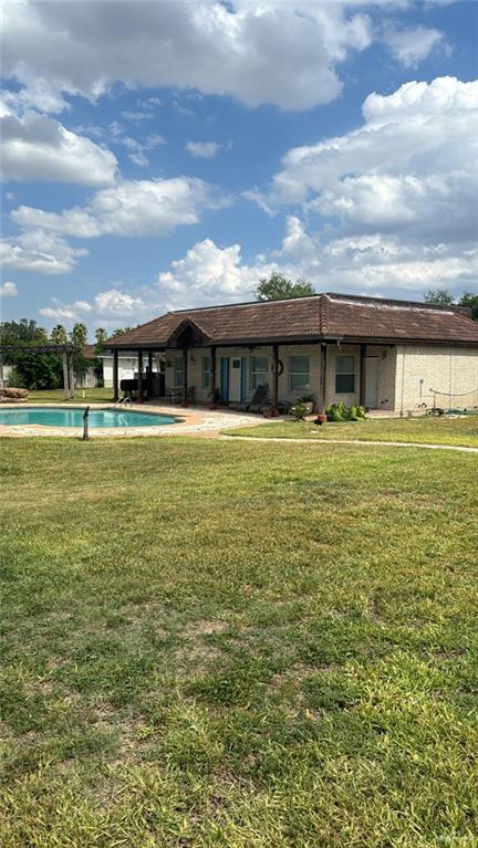 3702 North Glasscock Road Mission, TX 78573 - Photo 3 of 4 a view of a big yard with front of house
