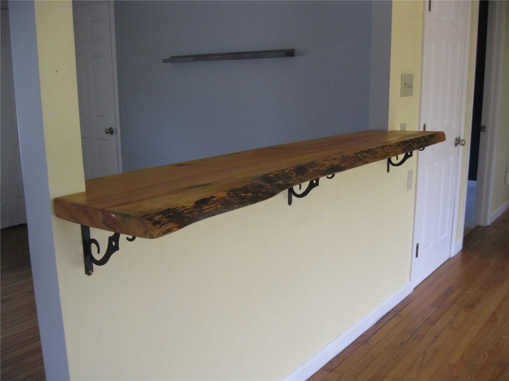 117 Weeks Mills Road South China, ME 04358 - Photo 6 of 26 Beautiful finished wood breakfast bar.