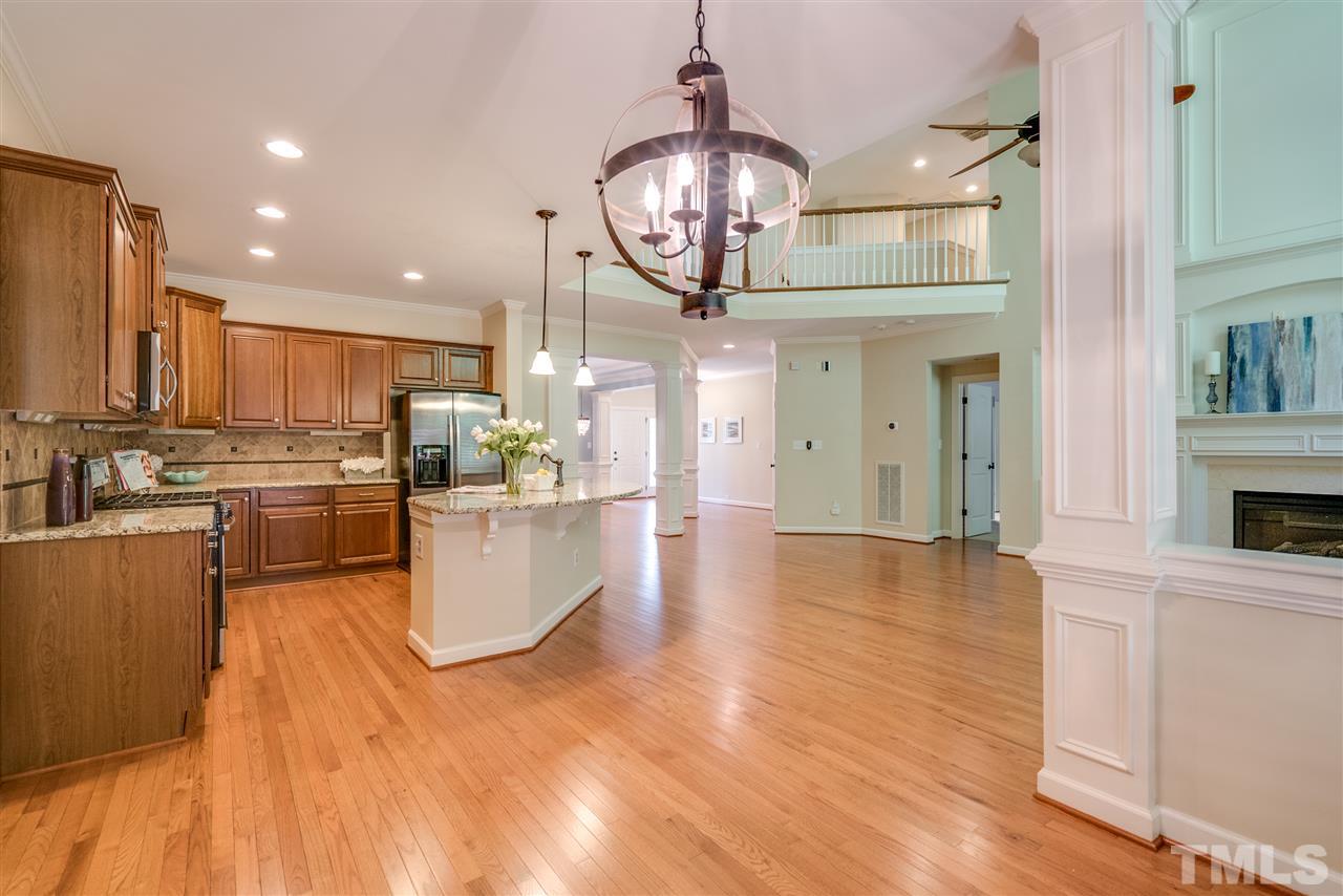 1016 Vino Drive Raleigh, NC 27607 - Photo 12 of 25 a view of kitchen with cabinets and wooden floor