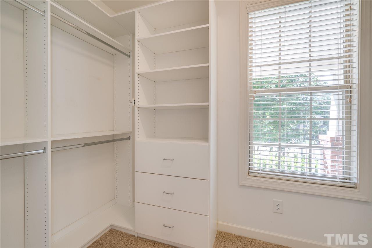 1016 Vino Drive Raleigh, NC 27607 - Photo 17 of 25 a view of an empty walk in closet