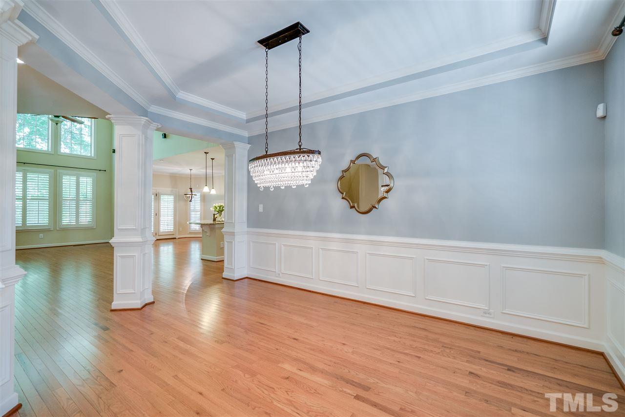 1016 Vino Drive Raleigh, NC 27607 - Photo 3 of 25 a view of an empty room with window and wooden floor