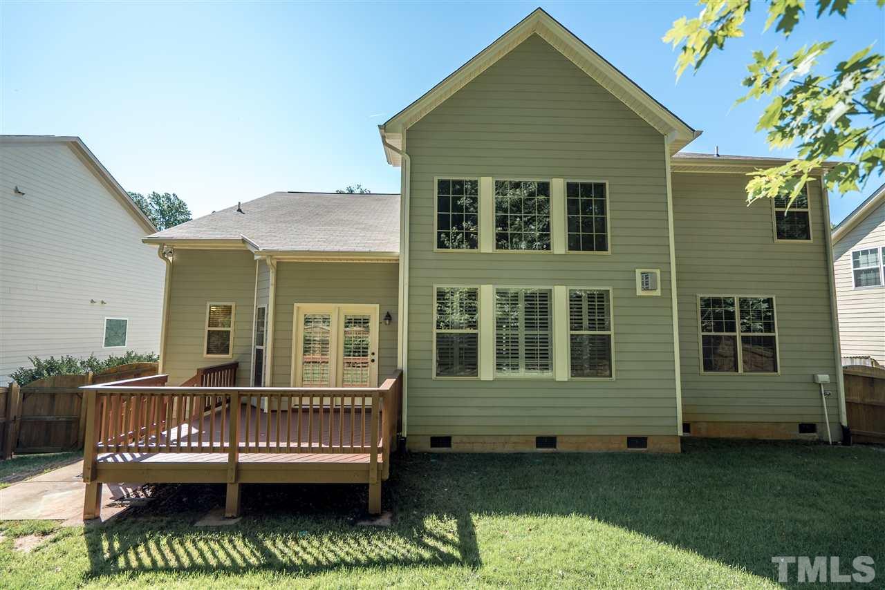 1016 Vino Drive Raleigh, NC 27607 - Photo 23 of 25 a view of a house with a roof deck