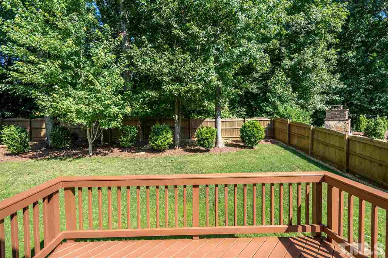 1016 Vino Drive Raleigh, NC 27607 - Photo 24 of 25 a view of a deck with a yard