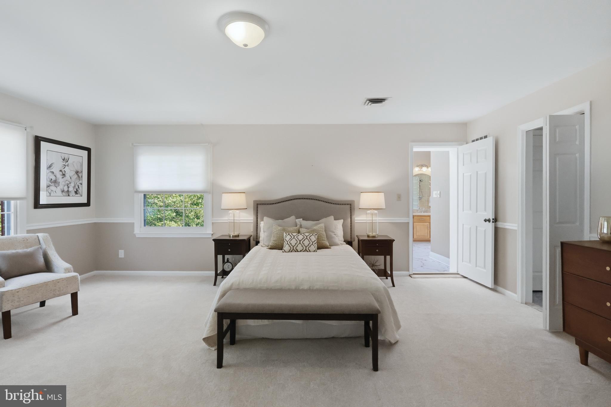 23500 River Road Lexington Park, MD 20653 - Photo 45 of 92 a bedroom with a bed and a couch