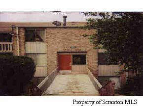 1401 Summit Point Scranton, PA 18508 - Photo 1 of 1 a black and white photo of a building