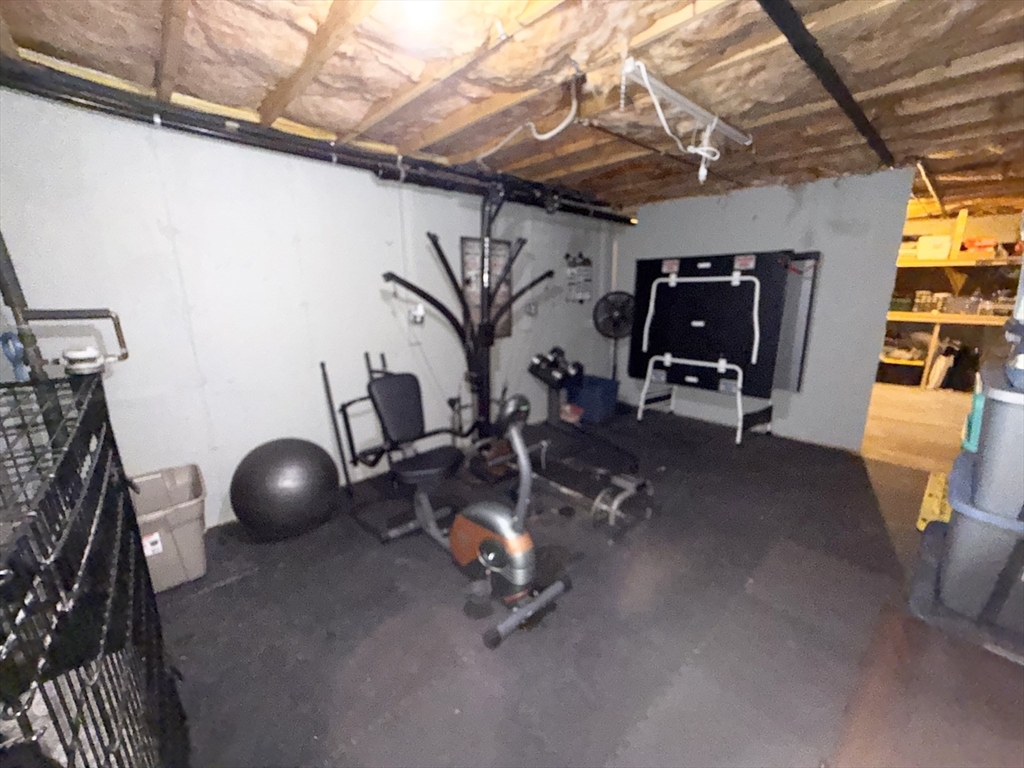 222 Bridge Street Warren, MA 01083 - Photo 30 of 40 a room with gym equipment and mirror