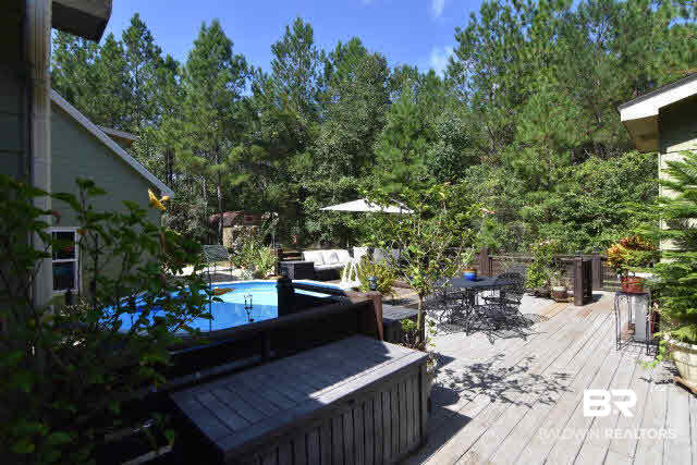13848 Elmwood Court Stapleton, AL 36578 - Photo 20 of 27 Have a cookout on this huge deck and then go for a plunge in the refreshing pool. Your own personal spa.