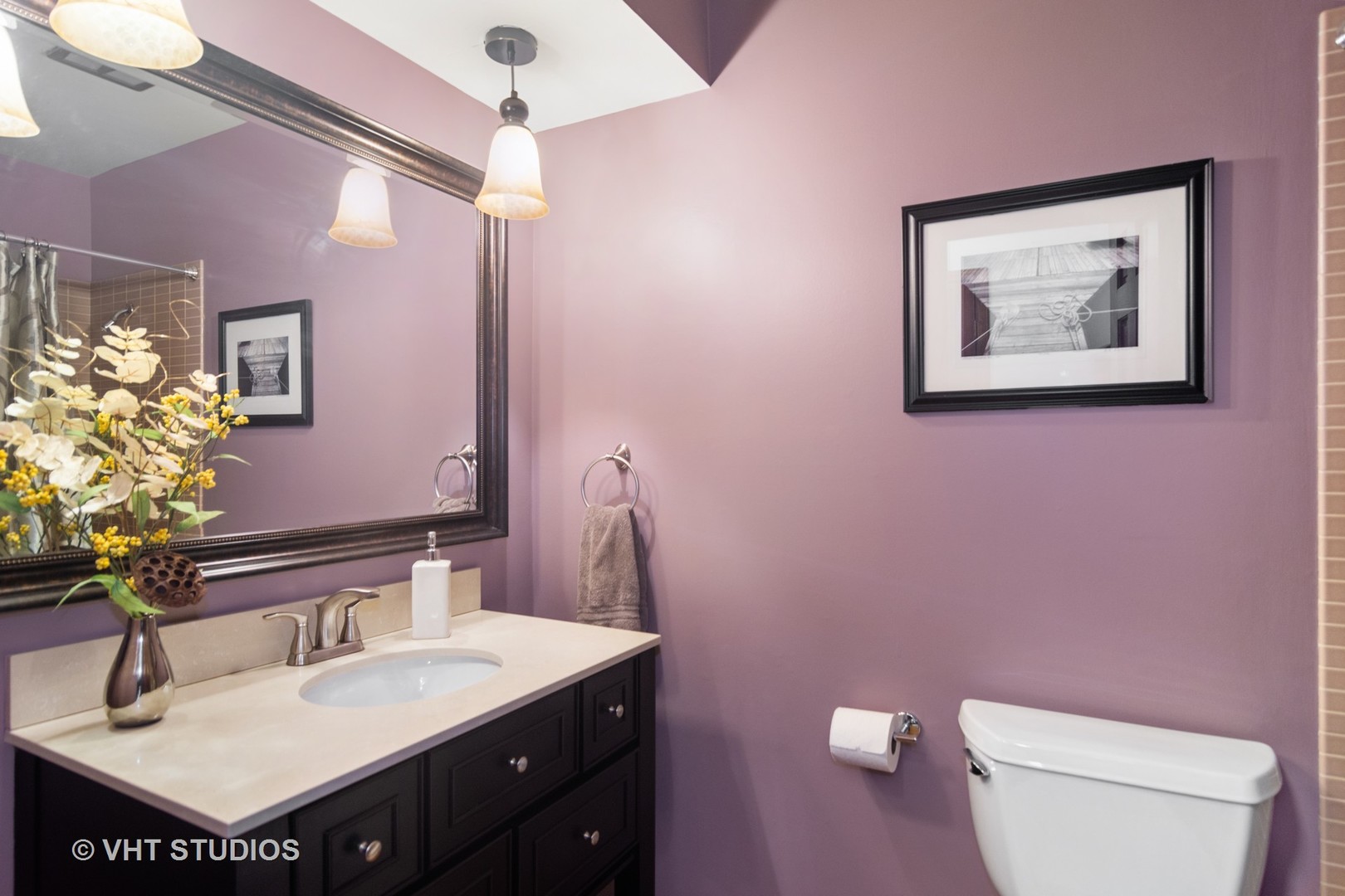 1 Applejack Road Rolling Meadows, IL 60008 - Photo 16 of 22 a bathroom with a sink vanity mirror and toilet