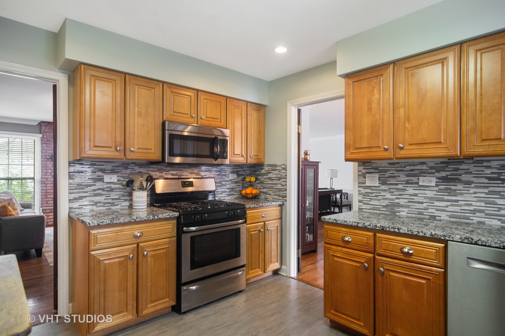 1 Applejack Road Rolling Meadows, IL 60008 - Photo 6 of 22 a kitchen with stainless steel appliances granite countertop white cabinets granite counter tops and a window