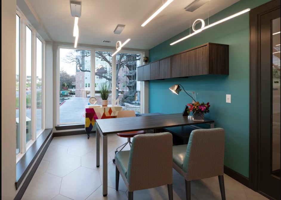 1800 South I- 35 Service Road Austin, TX 78748 - Photo 19 of 21 a dining room with furniture and a floor to ceiling window