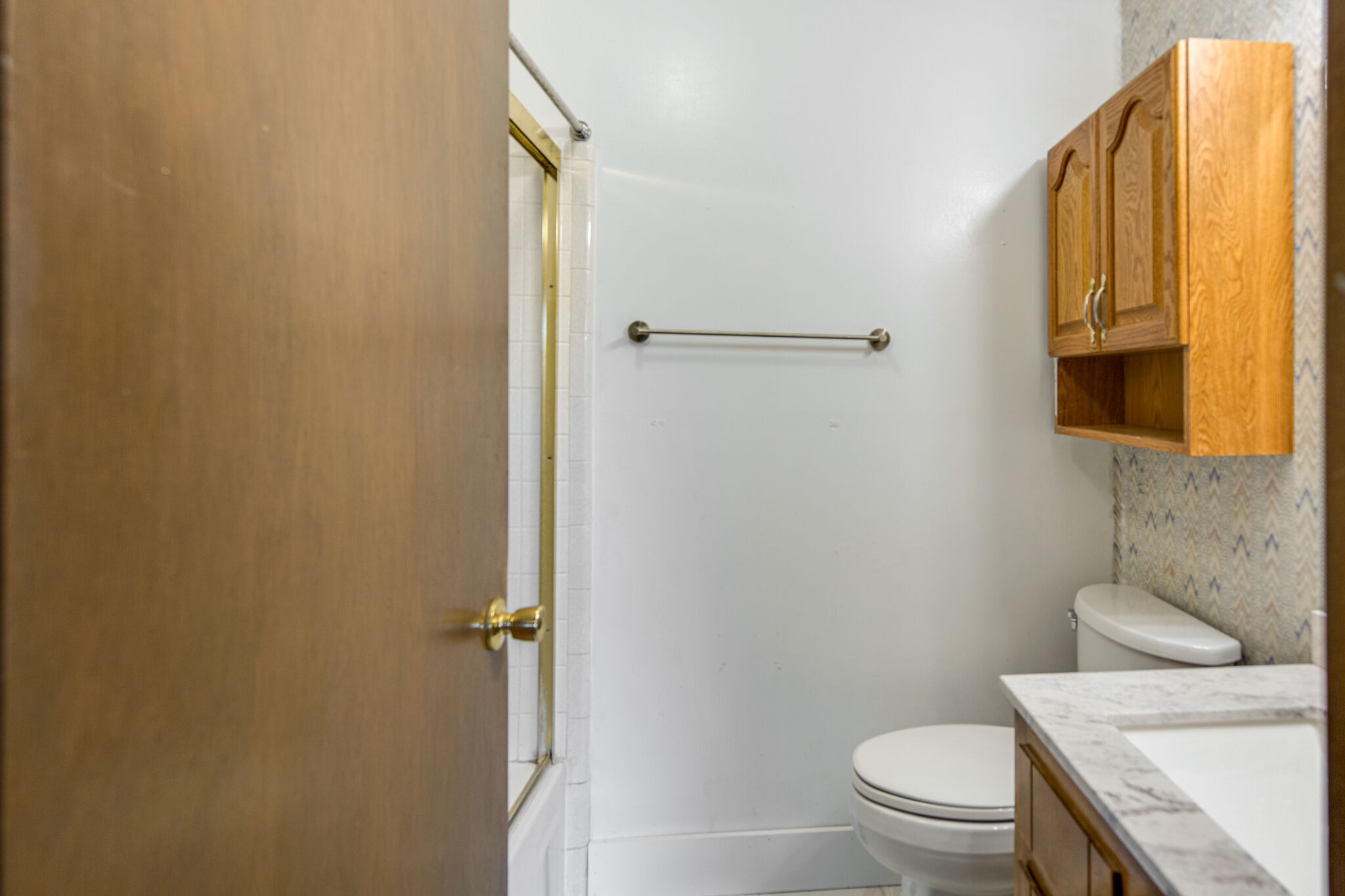 1022 Garton Road Burns, TN 37029 - Photo 14 of 23 a bathroom with a granite countertop toilet and a sink