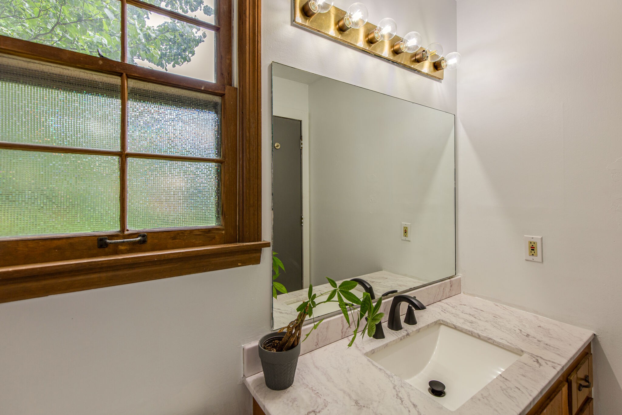 1022 Garton Road Burns, TN 37029 - Photo 18 of 23 a bathroom with a sink and a large mirror