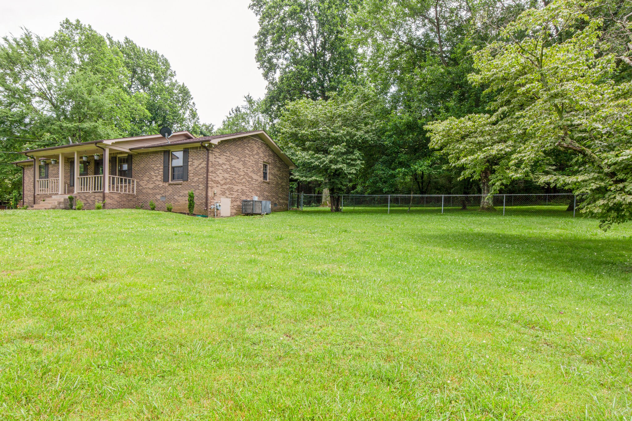 1022 Garton Road Burns, TN 37029 - Photo 3 of 23 a view of a house with a yard